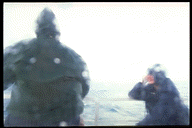 Drenched ferry passengers.